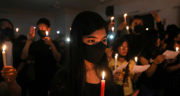 Myanmar citizens living in India hold a candle vigil, organised by Chin Refugee Committee, to pay tribute to people who died in Myanmar after the military coup, in New Delhi, India, March 24, 2021. REUTERS/Anushree Fadnavis