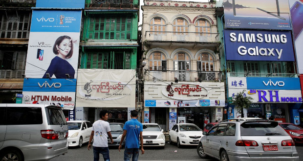 Cellphone shops are seen along Latha street in Yangon, Myanmar, August 8, 2018. REUTERS/Ann Wang/File Photo