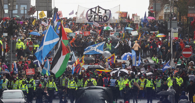 People take part in a protest during the UN Climate Change Conference (COP26), in Glasgow on November 6, 2021 Reuters