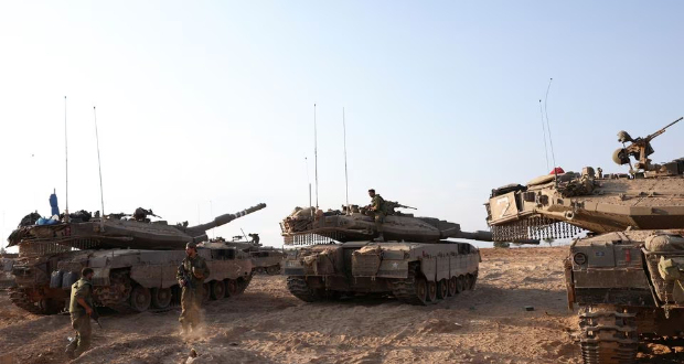 Israeli tanks are seen in the aftermath of a mass infiltration by Hamas gunmen from the Gaza Strip, in Kibbutz Beeri in southern Israel, October 14, 2023. REUTERS/Violeta Santos Moura