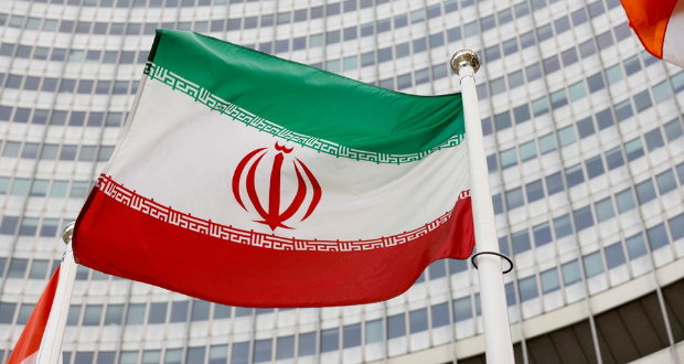 The Iranian flag flies in front of the International Atomic Energy Agency (IAEA) headquarters in Vienna, Austria May 23, 2021. REUTERS/Leonhard Foeger/File Photo