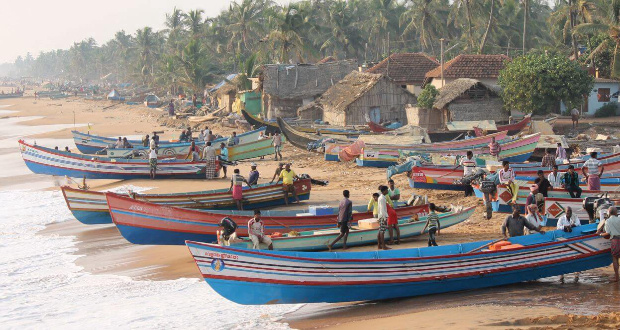 Fishermen at Valiathura beach are getting ready for their daily fish catch, while other community members enjoy the evening beauty of the beach. Photo: Langscape Magazine