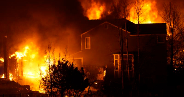 Colorado Wildfires Homes burn as wildfires rip through a development Thursday, Dec. 30, 2021, in Superior, Colo. (AP Photo/David Zalubowski) (David Zalubowski)