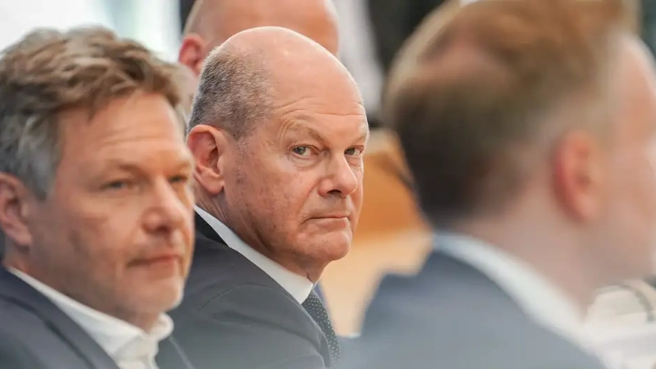 German Chancellor Olaf Scholz headed a three-way ruling coalition with the Greens and the FDP