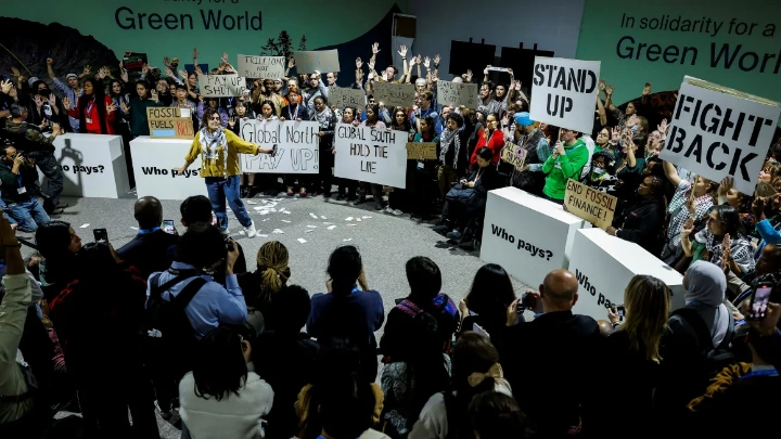 Activists attend a protest action at the COP29 United Nations climate change conference, in Baku, Azerbaijan, November 23, 2024. Maxim Shemetov/Reuters