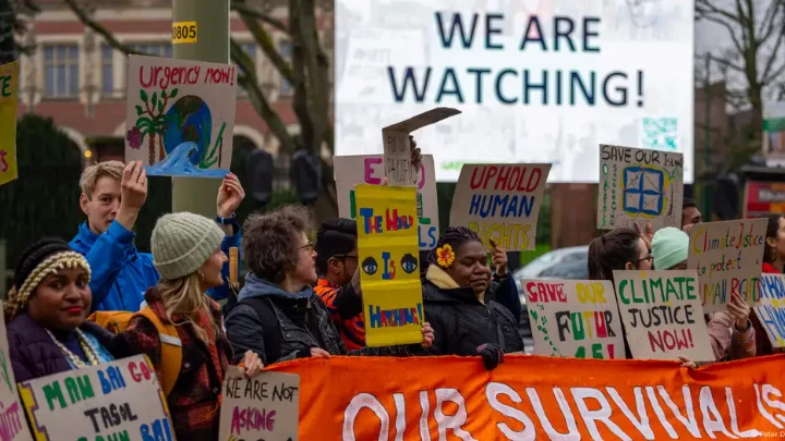 Activists hope the opinion from the ICJ's judges will have far-reaching legal consequences in the fight against climate changeImage: Peter Dejong/AP Photo/picture alliance