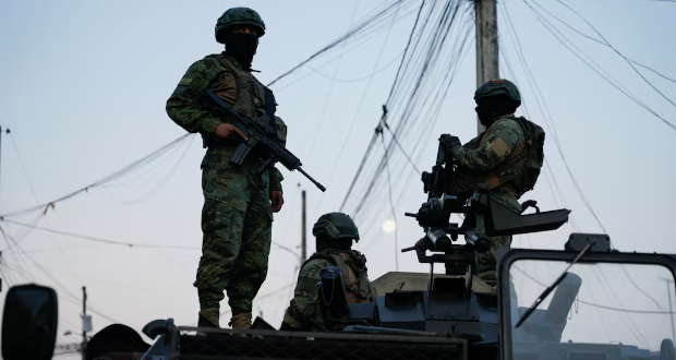 Soldiers atop an armoured vehicle stand guard during a joint military and police operation in the Socio Vivienda neighborhood, in Guayaquil, Ecuador March 26, 2024. REUTERS/Santiago Arcos/File Photo 