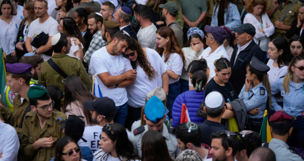 [object Object] Family members and friends of fallen soldiers at a ceremony marking Memorial Day at the Mount Herzl military cemetery in Jerusalem.